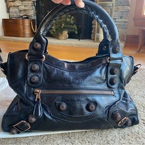 Balenciaga City Moto Bag w/rose gold hardware. Leather dyed black. No strap.